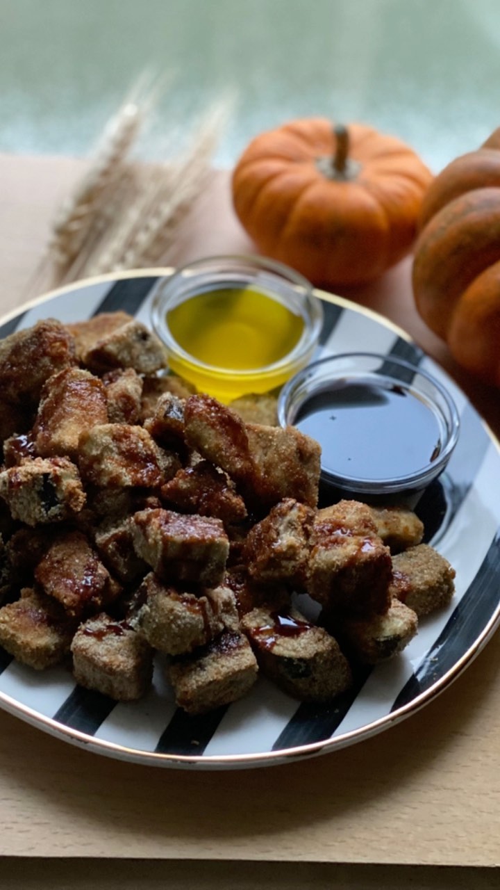 Crispy Eggplant with olive oilon the table