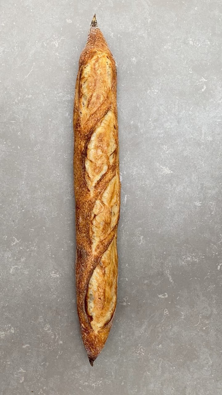 french sourdough baguette on the stand